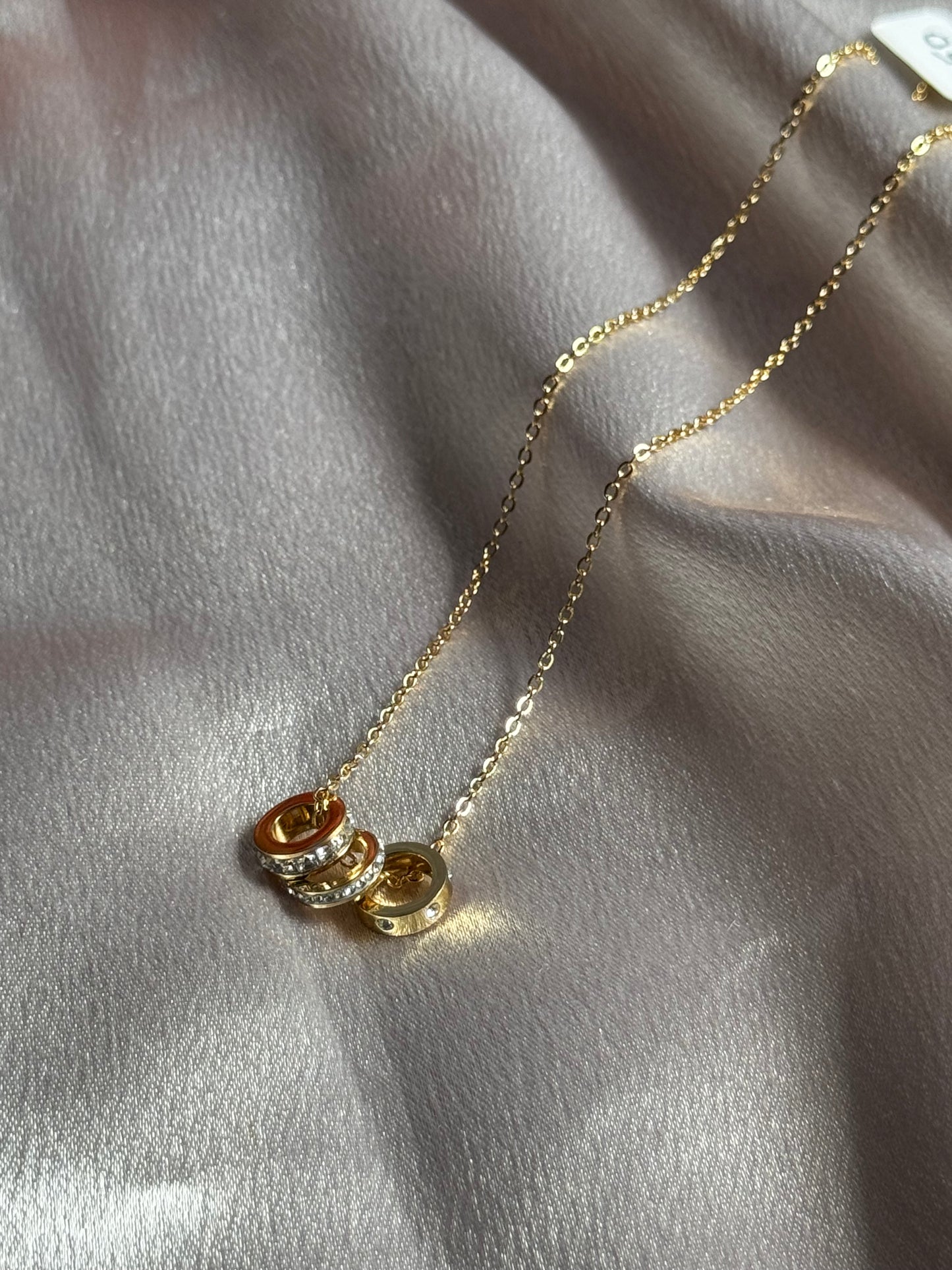 Triple Rolling Ring Pendant Necklace
